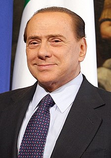 Silvio Berlusconi>